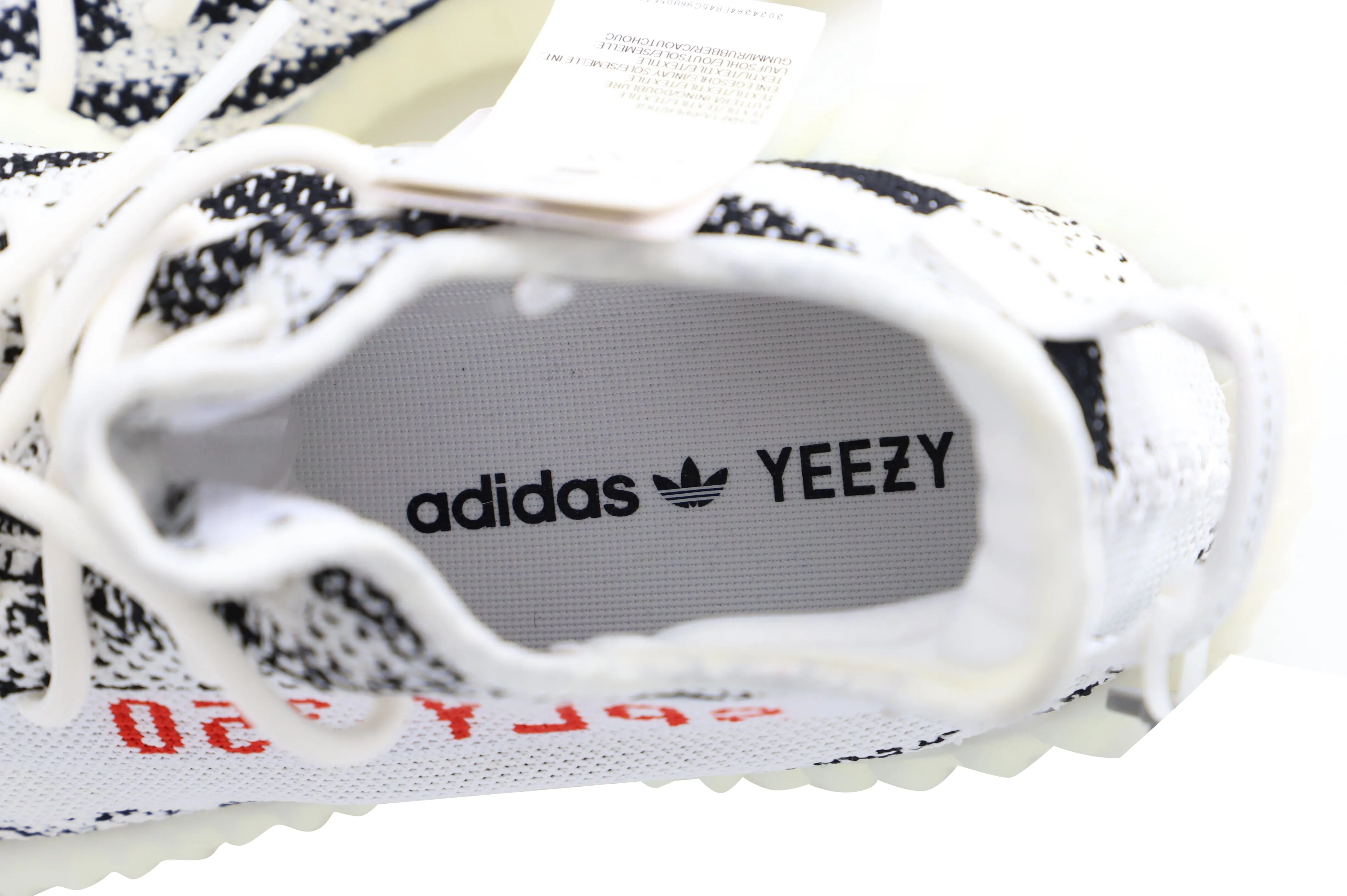 Adidas Yeezy Boost 350 V2 Zebra Sneakers in White Cotton